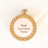 Ciondolo “Emergency Money” in oro giallo 9K e con banconota da 10 scellini, anno 1966