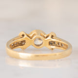 *RISERVATO* Anello “ballerina” in oro giallo 18K con diamanti di taglio brillante e di taglio tapered (0.71ctw ca.), anni ‘80