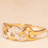 Anello vintage intrecciato in oro giallo e bianco 9K con diamanti (0.04ctw ca.), anni ‘70