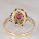 Anello a fiore antico in oro giallo 14K e argento con rubini (0.40ctw ca.) e diamanti di taglio vecchia miniera (0.65ctw ca.), primi del ‘900