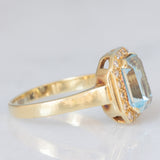 Anello vintage in oro giallo 14K con topazio azzurro (2.80ct ca.) e diamanti di taglio brillante (0.16ctw ca.), anni ‘80/‘90
