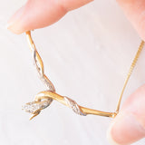 Collana vintage a forma di serpente in oro giallo e bianco 8K con diamanti, anni ‘70