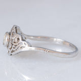 Anello Art Nouveau in oro bianco 18K con diamante di taglio vecchia miniera (0.10ct ca.), anni ‘20/‘30