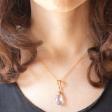 Pendente vintage in oro giallo 18K con topazio azzurro, anni ‘60