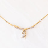 Collana vintage a forma di serpente in oro giallo e bianco 8K con diamanti, anni ‘70