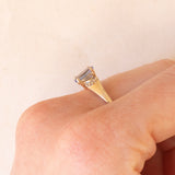 Anello ballerina vintage in oro giallo 9K con tanzanite (0.75ct ca.) e diamanti di taglio tapered (0.10ctw ca.), anno 2011