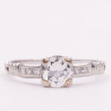 Solitario Art Déco in oro bianco 18K con diamanti di taglio brillante (0.61ctw ca.), anni ‘30