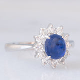 Anello a margherita vintage in platino con zaffiro (1.20ct) e diamanti (0.40ctw), anni ‘70/‘80