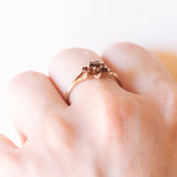 Anello a margherita vintage in oro giallo 9K con granati, anno 1979