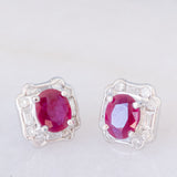 Orecchini a margherita vintage in platino con rubini (1.27ctw) e diamanti (0.50ctw), anni '80