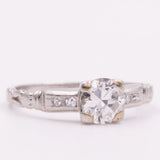 Solitario Art Déco in oro bianco 18K con diamanti di taglio brillante (0.61ctw ca.), anni ‘30