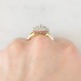 Anello vintage a fiore e a fascia con diamanti (0.52ctw ca.), anni ‘60/‘70