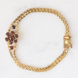 Braccialetto vintage in oro giallo 8K con granati (0.90ctw ca.), anni ‘50