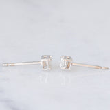 Orecchini punto luce in oro bianco 18K con diamanti di taglio brillante (0.28ctw ca.)