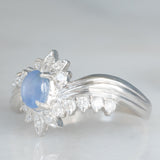 Anello a margherita vintage in platino con zaffiro stellato (0.71ct) e diamanti (0.27ctw), anni ‘80/‘90