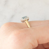 Anello a margherita vintage in oro giallo 9K con topazio azzurro (0.55ct ca.) e diamanti (0.05ctw ca.)