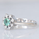 Anello a margherita vintage in oro bianco 14K con tormalina verde (0.35ct ca.) e diamanti (0.24ctw ca.), anni ‘80
