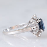 Anello a margherita vintage in platino con zaffiro (1.27ct) e diamanti (0.43ctw), anni ‘80
