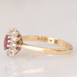 Anello a margherita vintage in oro giallo 9K con rubino (0.35ct ca.) e diamanti (0.06ctw ca.), anno 1984