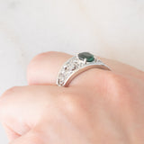Anello a fascia in platino con tormalina verde (1.13ct) e diamanti (0.38ctw) e con lavorazioni a traforo, anni '90/anni '2000