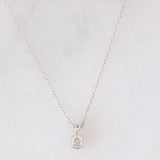 Collana vintage in oro bianco 10K con ciondolo punto luce con zaffiro rosa e diamante