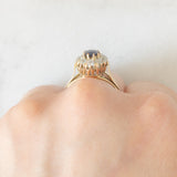 Anello a margherita antico in oro giallo 14K con zaffiro (0.40ct ca.) e diamanti di taglio vecchia miniera (0.70ctw ca.), anni ‘20/‘30