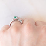Anello a fiore vintage in platino con smeraldo (0.81ct) e diamanti (0.93ctw), anni ‘80