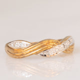 Anello vintage con design intrecciato in oro giallo e bianco 9K con diamanti, anni ‘80/‘90