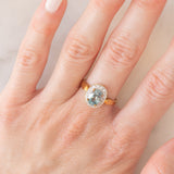 Anello a margherita in oro giallo 9K con zircone azzurro (1.83ct ca.) e zirconi bianchi