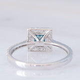 Anello a margherita vintage in oro bianco 18K con diamante blu (0.54ct) e diamanti bianchi (0.40ctw)