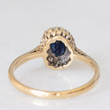 Anello a margherita vintage in oro giallo 9K con zaffiro (0.75ct ca.) e diamanti (0.10ctw ca.), anno 1981
