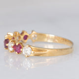 Mezzo eternity vintage in oro giallo 18K con rubini (0.40ctw ca.) e diamanti di taglio brillante (0.50ctw ca.), anni ‘80