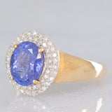 Anello a margherita vintage in oro giallo e bianco 14K con tanzanite (2.10ct ca.) e diamanti (0.30ctw ca.), anni ‘80