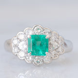 Anello a margherita vintage in platino con smeraldo colombiano (1.07ct) e diamanti (1.01ctw), anni ‘80