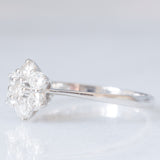 Anello a margherita vintage in oro bianco 14K con diamanti di taglio brillante (0.55ctw ca.), anni ‘80