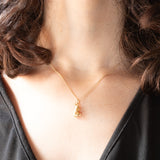 Ciondolo vintage a forma di coniglietto in oro giallo 18K