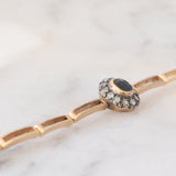 Braccialetto semirigido retrò in oro giallo 14K a argento con zaffiro (1ct ca.) e diamanti di taglio rosetta (0.36ctw ca.), anni ‘40/‘50