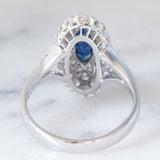Anello a margherita navette in oro bianco 14K con zaffiro (1ct ca.) e diamanti (0.72ctw ca.), anni ‘70/‘80