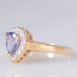 Anello a margherita vintage in oro giallo e bianco 9K con tanzanite (0.60ct ca.), anni ‘90