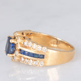 Anello a fascia + a margherita vintage in oro giallo 14K con zaffiri (0.65ctw ca.) e diamanti (0.25ctw ca.), anni ‘70