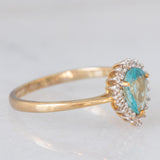 Anello a margherita a goccia in oro giallo 9K con apatite (0.59ct) e zirconi bianchi