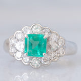 Anello a margherita vintage in platino con smeraldo colombiano (1.07ct) e diamanti (1.01ctw), anni ‘80