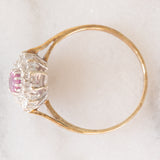 Anello a margherita vintage in oro giallo 9K con rubino (0.40ct ca.) e diamanti (0.28ctw ca.), anno 1987