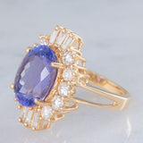 Anello ballerina vintage in oro giallo 14K con tanzanite (5.60ct ca.) e diamanti di taglio brillante e tapered (1.30ctw ca.), anni ‘80