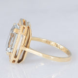 Anello a margherita vintage in oro giallo 14K con acquamarina (3.30ct ca.) e diamanti (0.22ctw ca.), anni ‘70