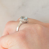 Anello a margherita vintage in platino con acquamarina (1ct) e diamanti, anni ‘70