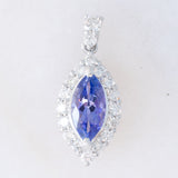 Ciondolo a margherita vintage in platino con tanzanite (0.81ct) e diamanti (0.37ctw)