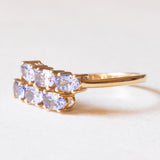 Anello moderno in oro giallo 9K con tanzaniti (1ctw ca.)