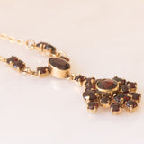 Collier vintage in oro giallo 8K con granati, anni ‘50/‘60