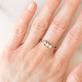 Trilogy vintage in oro giallo e bianco 14K con diamanti di taglio brillante (0.30ctw ca.), anni ‘60/‘70